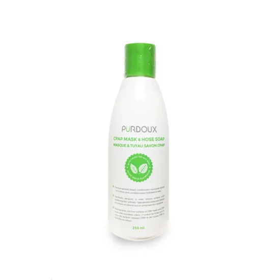 Purifying CPAP mask and hose soap bottle with green cap.