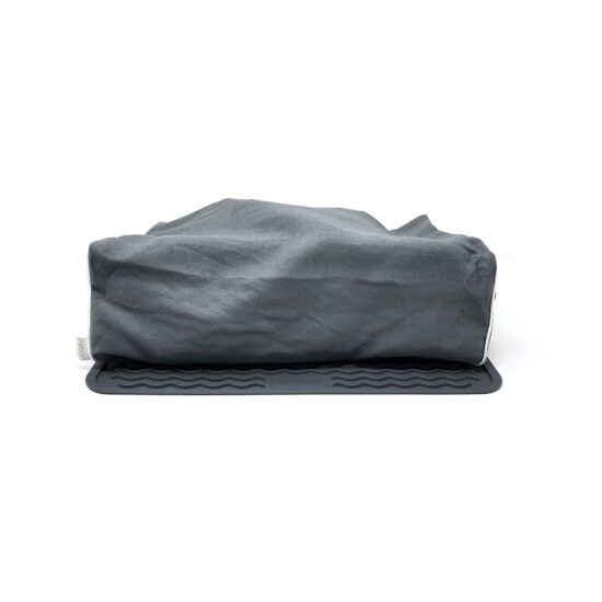 CPAP device covered with a grey fabric on a black base in Westcourt QLD business.